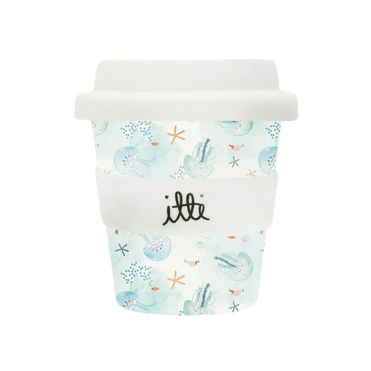 Baby cino cup with white lid and green blue background. Makes the perfect first birthday gift. It has cute happy jellyfish and starfish. 