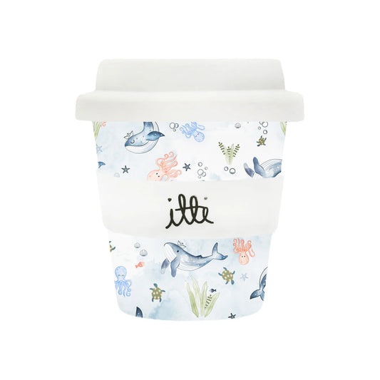 Pastel blue ocean themed baby cino cup with two straws. Soft coloured sea creatures on the cup include; octopus, whale, turtle and fish