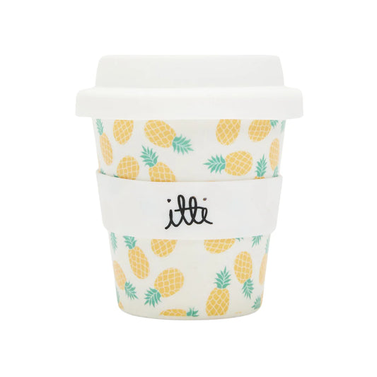 Baby cino cup with white lid and background. It features groovy pineapple print. Includes 2 straws. The perfect first birthday gift or stocking stuffer. 