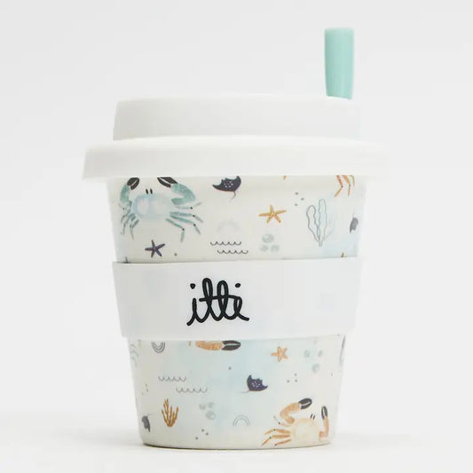 Baby cino cup with white lid and background. It features sea creatures such as crabs, starfish, coral and stingrays. Includes 2 straws. The perfect first birthday gift or stocking stuffer. 